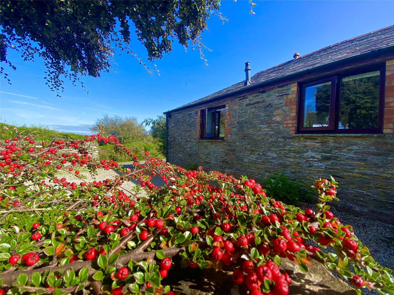Elderberry Cottage at Polrunny Farm Cornwall has lovely sea and rural views