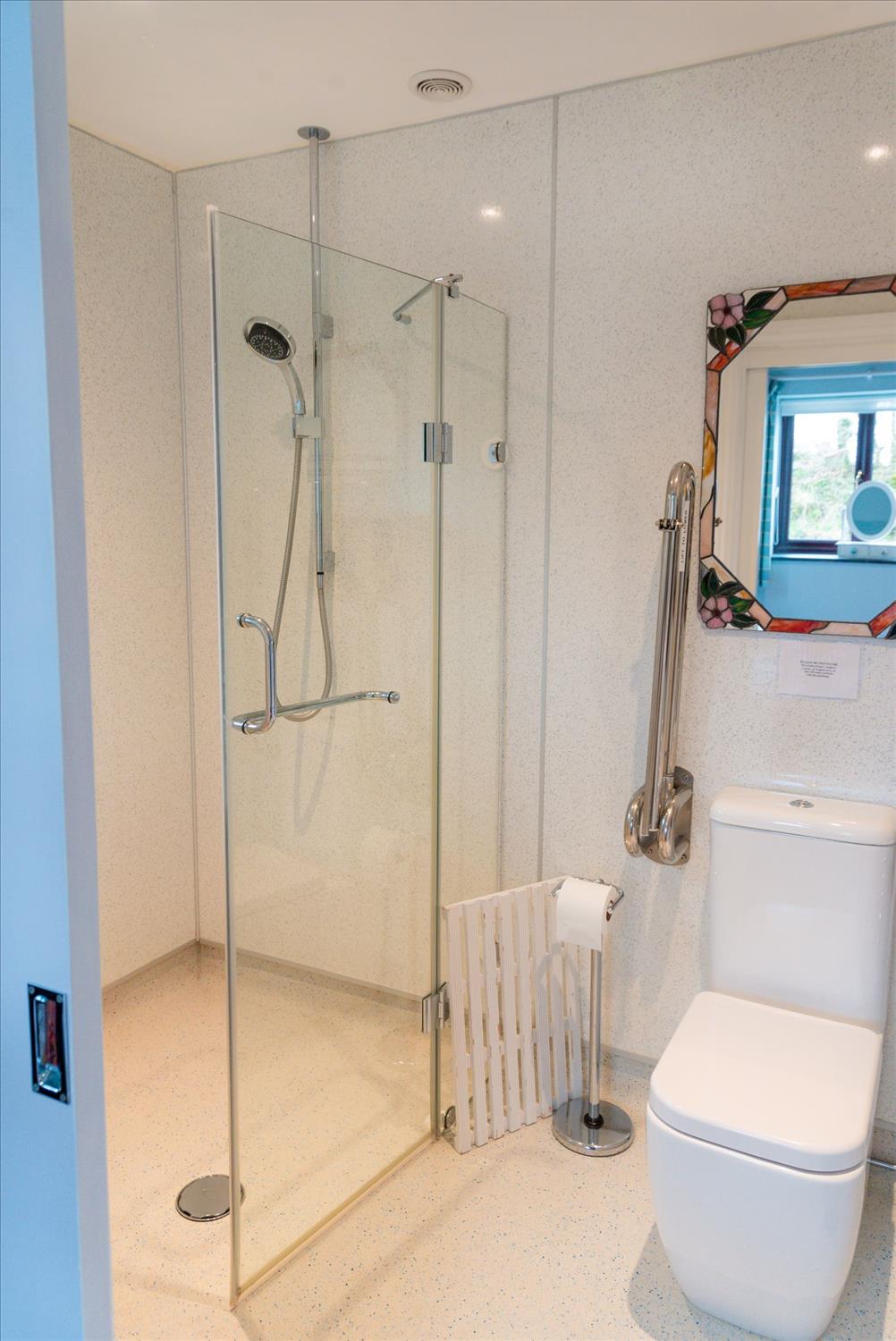 Sloe Cottage's 'Wet room'-style bathroom, with remote control shower and accessible toilet