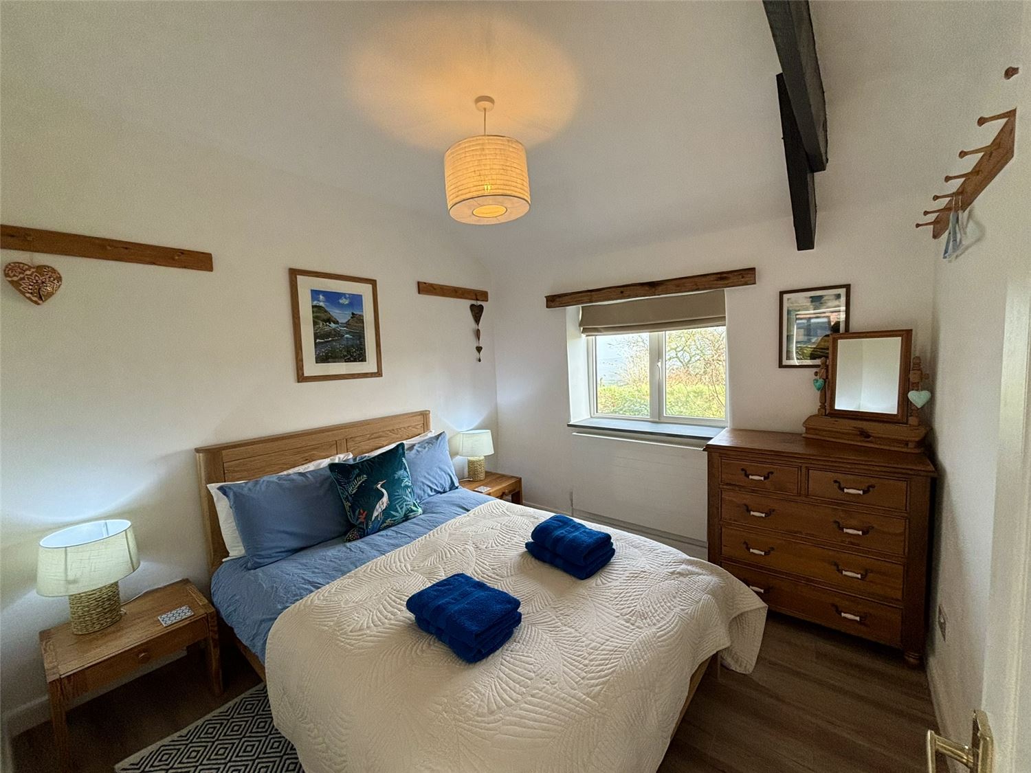 The light and airy double bedroom at Polrunny Farm's Seaberry Cottage, again with the sea view obliterated by the fog.