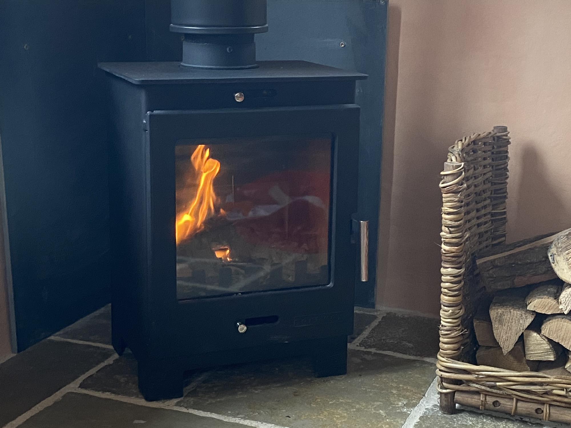 Cosy log burner in sea view Blueberry Cottage Polrunny Farm Cornwall