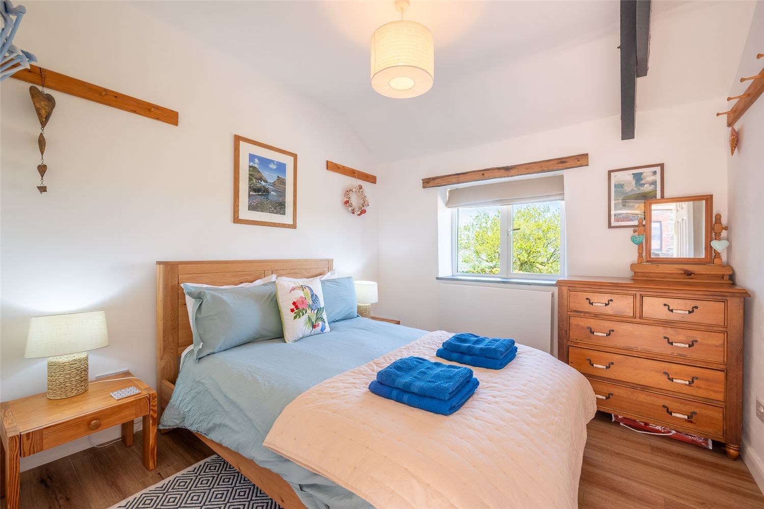 The light and airy double bedroom at Polrunny Farm's Seaberry Cottage, again with the sea view obliterated by the fog.